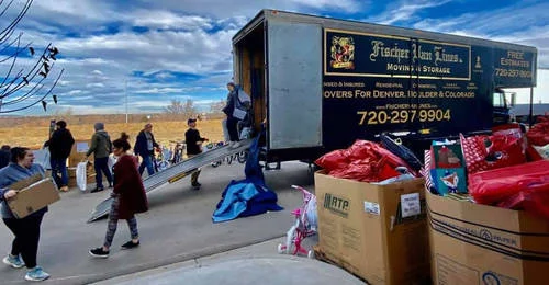 Denver Movers at Fischer Van Lines, Denver Moving Company LLC, unloading a truck in Denver, Colorado.