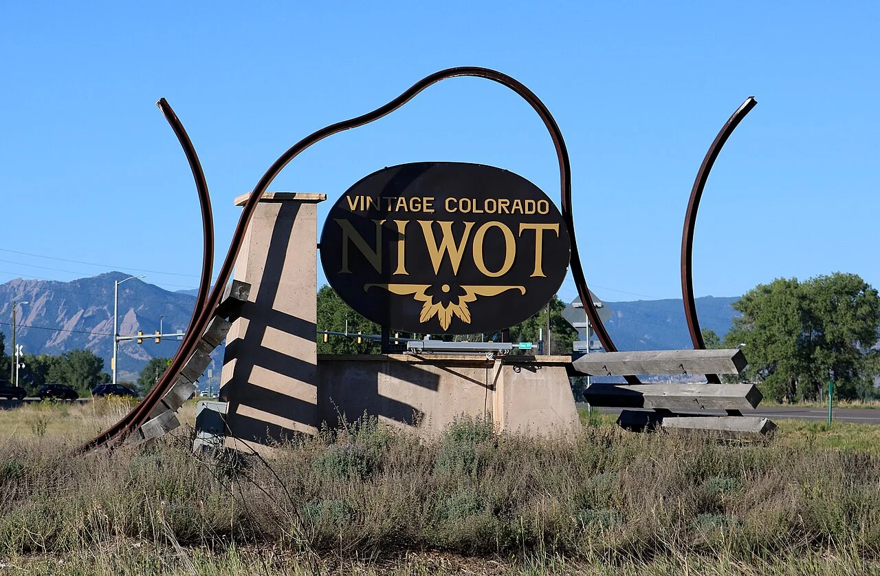 Vintage Colorado Niwot town sign along Highway 119 in Niwot, Colorado
